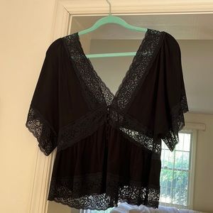 Forever21 Size Large black v-neck symmetrical short sleeve shirt.